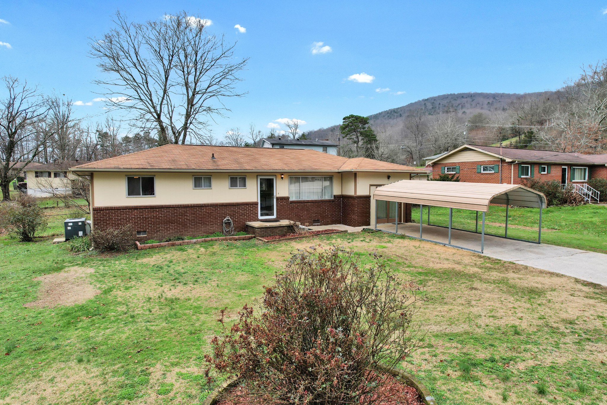 3372 Adkins Road ranch house, front yard and carport